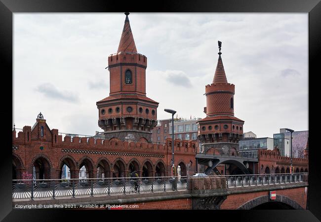 Oberbaum Bridge in Berlin on a cloudy day, in Germany Framed Print by Luis Pina