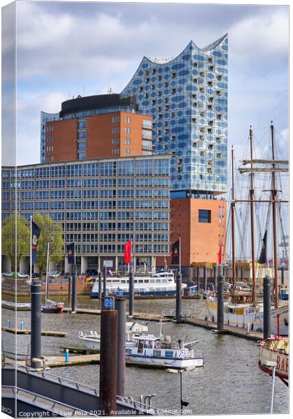Elbphilharmonie concert hall in Hamburg with the boats marina on the front Canvas Print by Luis Pina