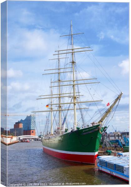 Beautiful green old boat with the Elbphilharmonie on the background Canvas Print by Luis Pina