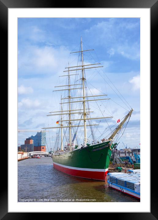 Beautiful green old boat with the Elbphilharmonie on the background Framed Mounted Print by Luis Pina