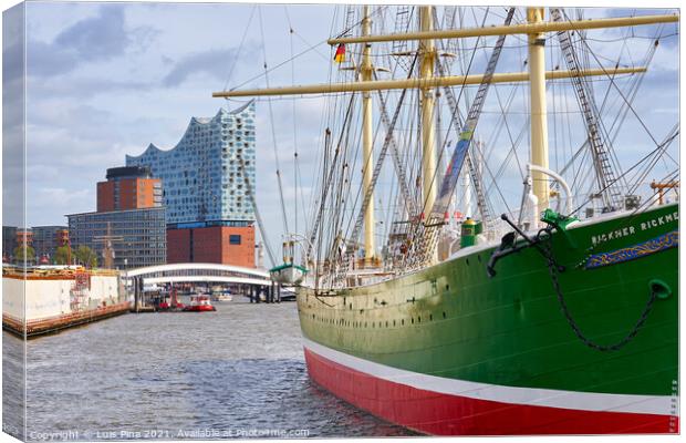 Beautiful green old boat with the Elbphilharmonie on the background Canvas Print by Luis Pina