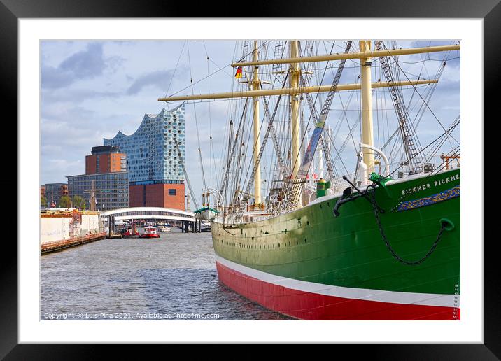 Beautiful green old boat with the Elbphilharmonie on the background Framed Mounted Print by Luis Pina