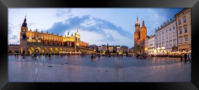 A panorama picture of Krakow`s Main Square Rynek Główny featuring the Cloth Hall, St. Mary`s Basilica and the Town Hall Tower Framed Print by Arpan Bhatia