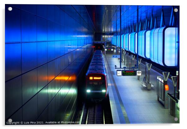 Train at the Subway station with blue lights at University on the Speicherstadt area in Hamburg Acrylic by Luis Pina