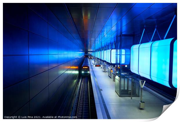 Train at the Subway station with blue lights at University on the Speicherstadt area in Hamburg Print by Luis Pina