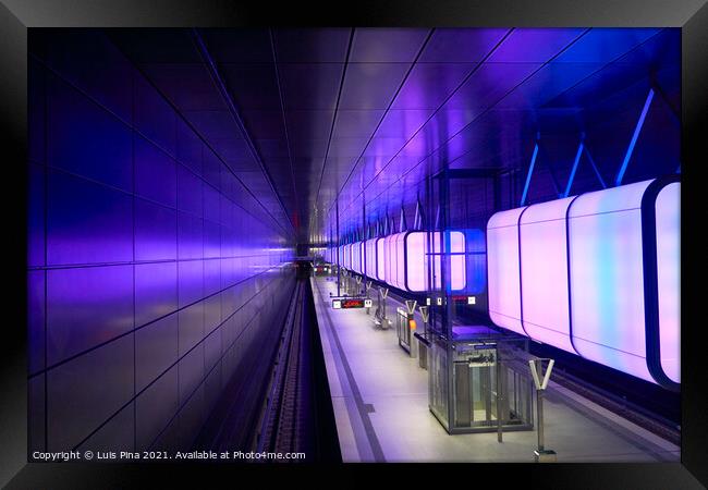 Subway station with purple lights at University on the Speicherstadt area in Hamburg Framed Print by Luis Pina