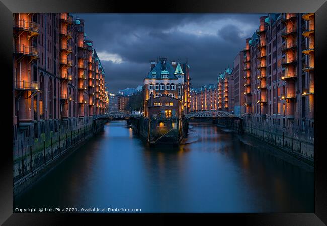 Traditional Buildings At The Speicherstadt Area In Hamburg Framed Print by Luis Pina