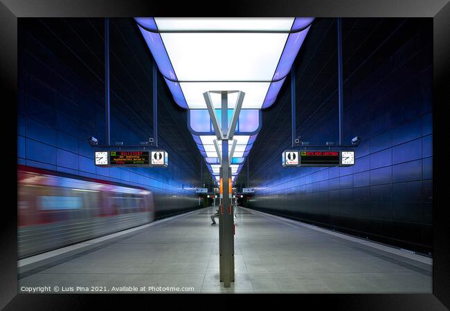 Subway station with blue lights at University on the Speicherstadt area in Hamburg Framed Print by Luis Pina