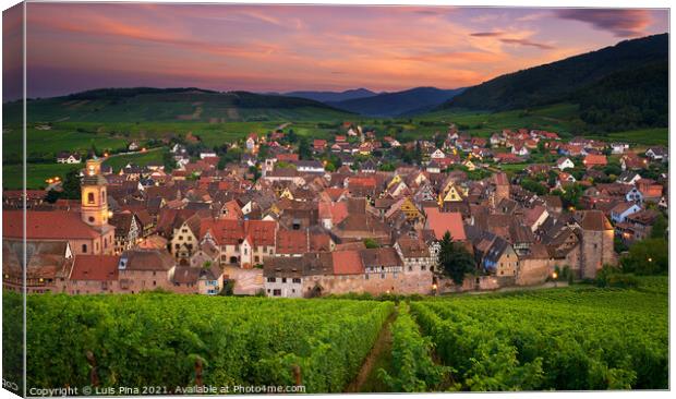 View of Riquewihr from the top of the hill with a vineyard on the foreground Canvas Print by Luis Pina
