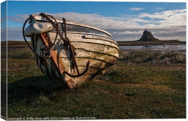 Fishing Coble on the shore at Holy Island Canvas Print by Phillip Dove LRPS