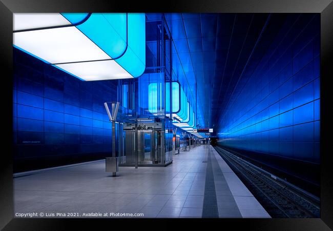 Subway station with blue lights at University on the Speicherstadt area in Hamburg Framed Print by Luis Pina