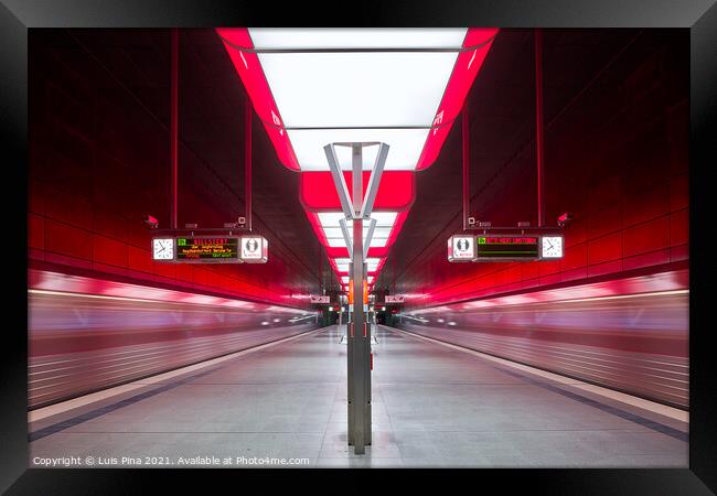 Subway station with red lights at University on the Speicherstadt area in Hamburg Framed Print by Luis Pina