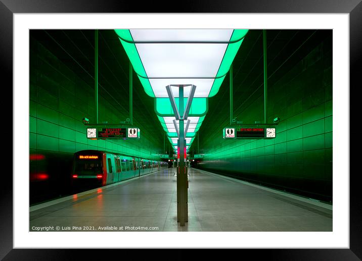 Subway station with green lights at University on the Speicherstadt area in Hamburg Framed Mounted Print by Luis Pina