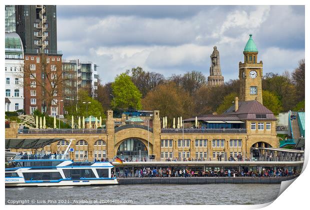 View of St. Pauli's Pier Landungsbrücken station tower with buildings and boats in Hamburg Print by Luis Pina