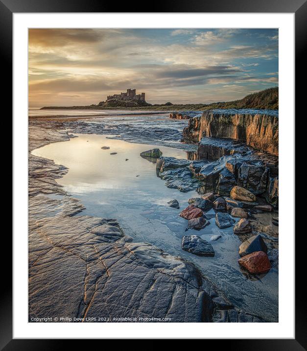 Bamburgh Castle by morning light Framed Mounted Print by Phillip Dove LRPS