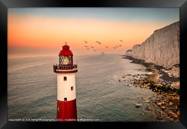 Beachy Head lighthouse at sunrise Framed Print by A N Aerial Photography