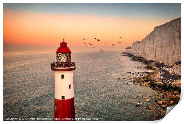Beachy Head lighthouse at sunrise Print by A N Aerial Photography