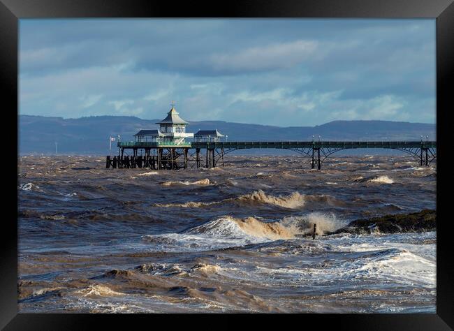 Clevedon Pier with choppy seas Framed Print by Rory Hailes