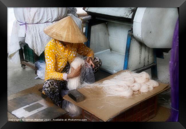 Mastering the Art of Rice Noodle Making Framed Print by Simon Marlow