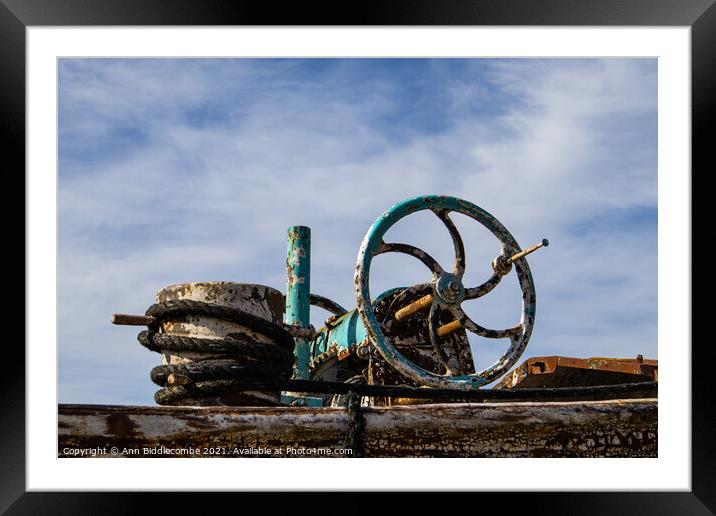 An old barge anchor winch Framed Mounted Print by Ann Biddlecombe