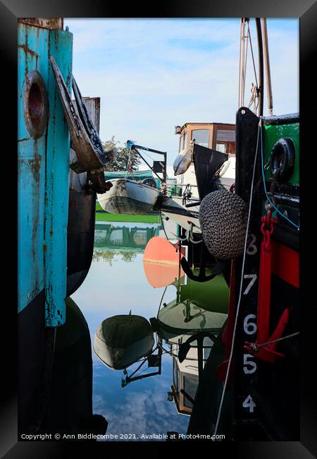 Reflections between barges Framed Print by Ann Biddlecombe