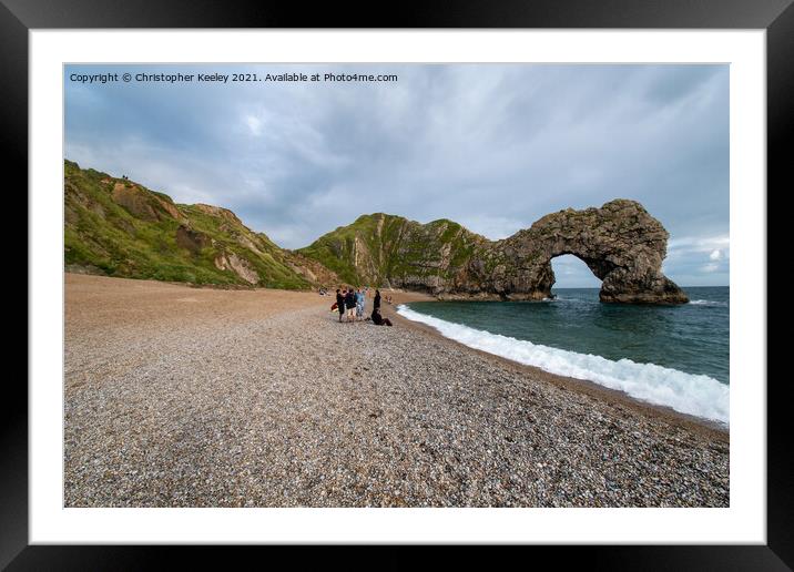 Durdle Door and tourists Framed Mounted Print by Christopher Keeley