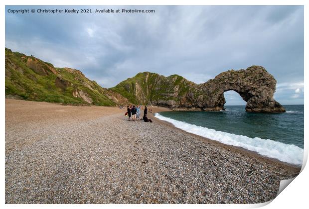 Durdle Door and tourists Print by Christopher Keeley