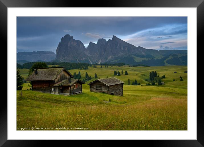 Sassolungo mountains on the Italian Alps Dolomites with wood houses on the foreground Framed Mounted Print by Luis Pina