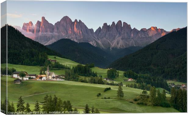 Village of Santa Magdalena and church on the Italian mountains Dolomites Alps at sunrise Canvas Print by Luis Pina