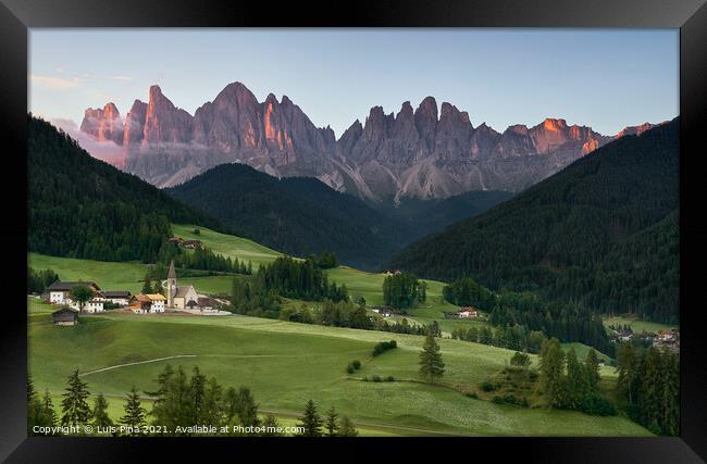 Village of Santa Magdalena and church on the Italian mountains Dolomites Alps at sunrise Framed Print by Luis Pina
