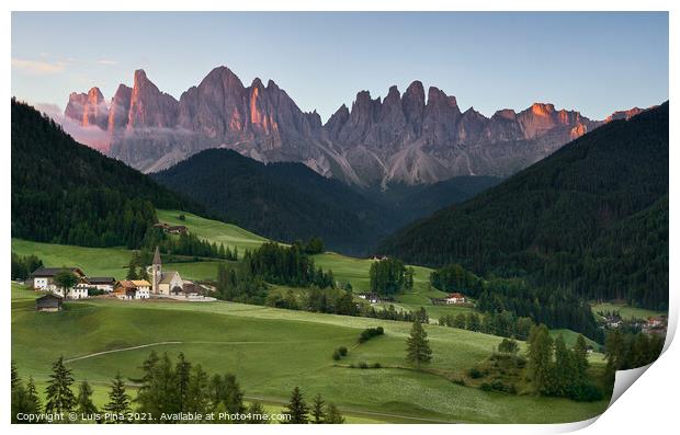 Village of Santa Magdalena and church on the Italian mountains Dolomites Alps at sunrise Print by Luis Pina
