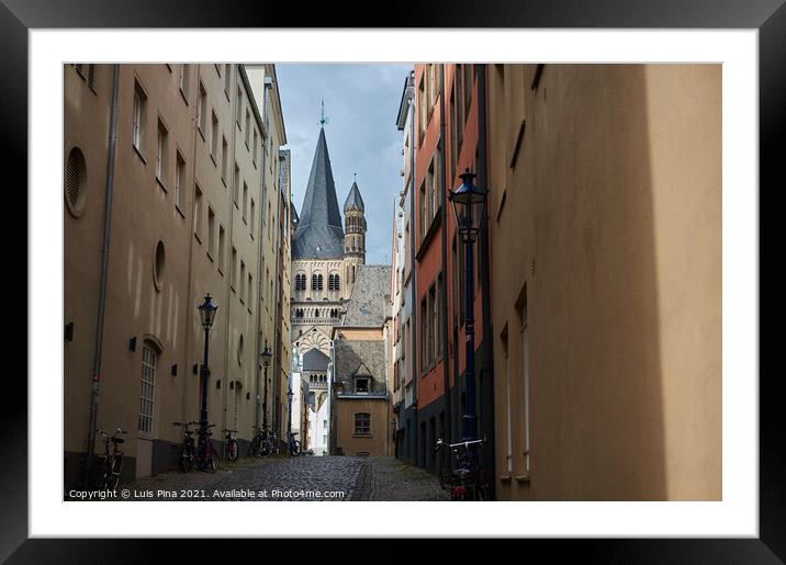 Great St Martin Church seen from an antique and medieval buildings street Framed Mounted Print by Luis Pina