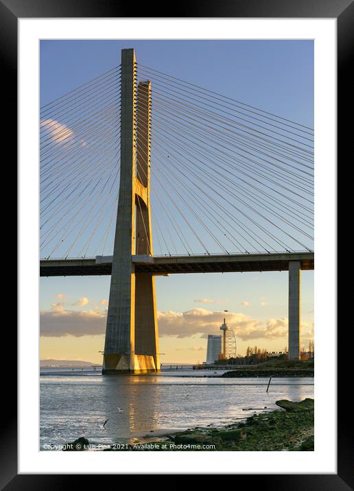 Ponte Vasco da Gama Bridge view near the Rio Tejo river at sunset Framed Mounted Print by Luis Pina