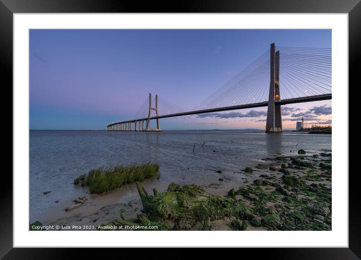 Ponte Vasco da Gama Bridge view near the Rio Tejo river after sunset Framed Mounted Print by Luis Pina