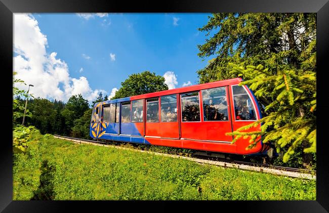Zakopane, Poland - August 13, 2021: Funicular railway at Gubalowka , Passengers or tourist traveling inside cable car wearing protective mask as a covid precaution in summer Framed Print by Arpan Bhatia