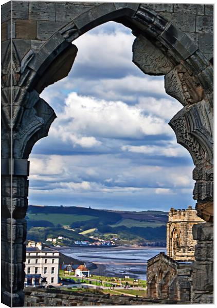 Whitby through the Arch Canvas Print by Joyce Storey