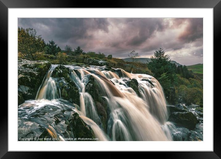 A large waterfall at Sunset Framed Mounted Print by Ivor Bond