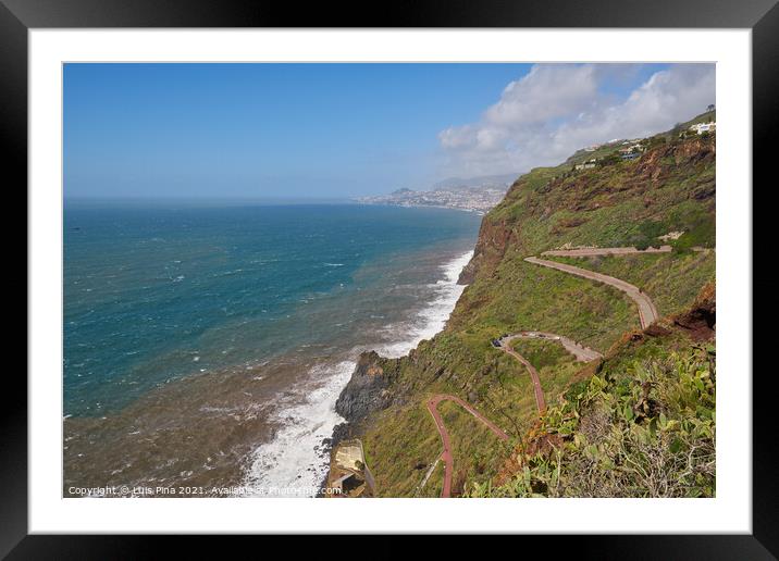 Aerial view of a road with many curves in Canico, Madeira on the coastline Framed Mounted Print by Luis Pina