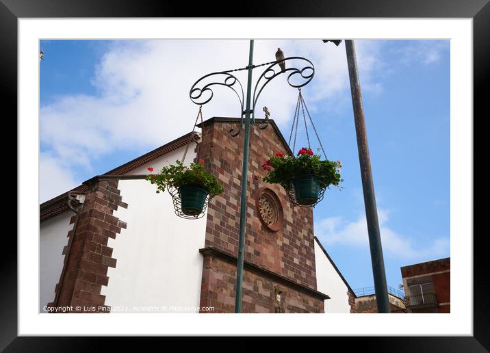 Funchal Cathedral church seen from the street with flowers hanging in Madeira Framed Mounted Print by Luis Pina