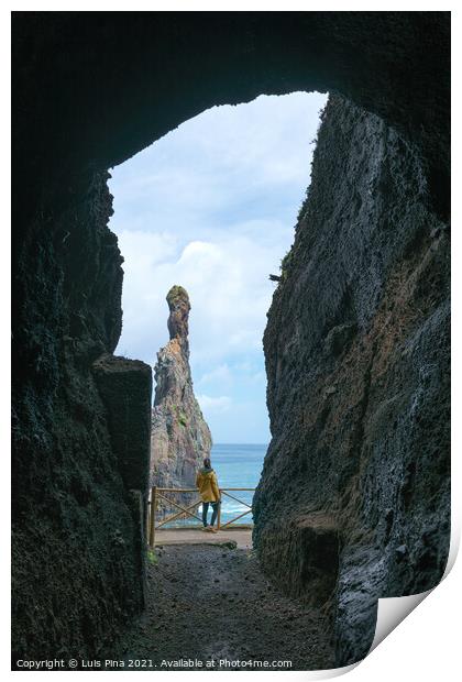 Girl looking at Ribeira da Janela islet between a cave in Madeira Print by Luis Pina