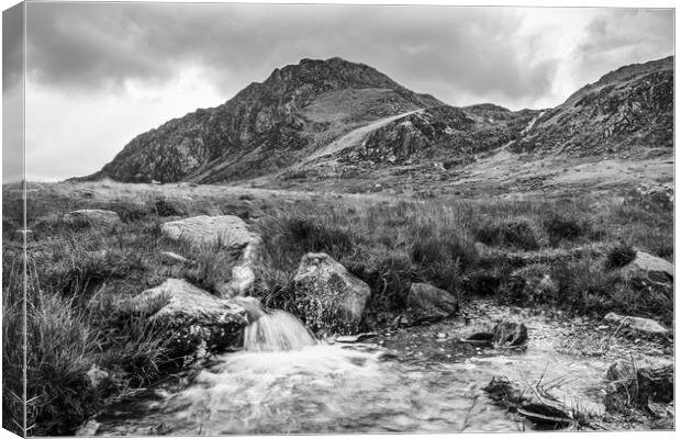 Water spilling into a pool at Pont Pen-y-benglog Canvas Print by Jason Wells