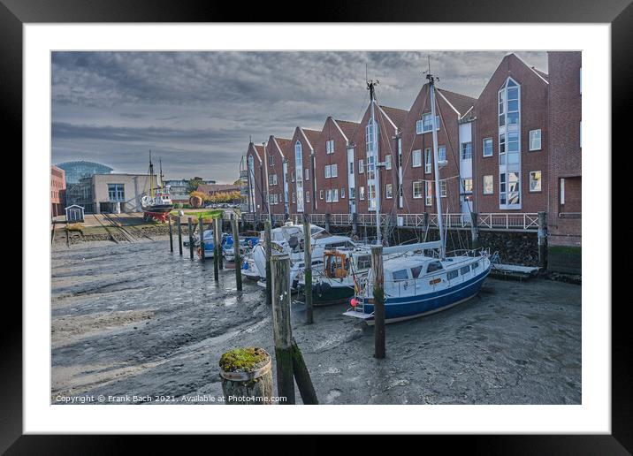 Husum harbor at ebb tide in the marshes, Germany Framed Mounted Print by Frank Bach