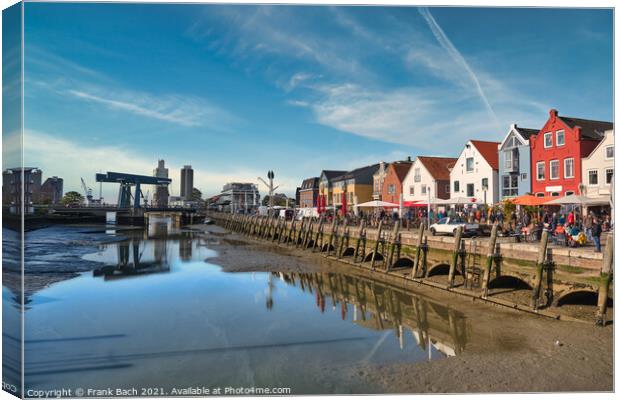Husum harbor at ebb tide in the marshes, Germany Canvas Print by Frank Bach