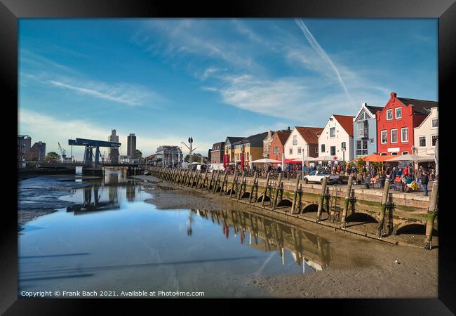 Husum harbor at ebb tide in the marshes, Germany Framed Print by Frank Bach