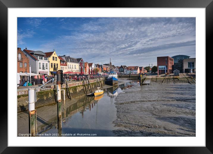Husum harbor at ebb tide in the marshes, Germany Framed Mounted Print by Frank Bach
