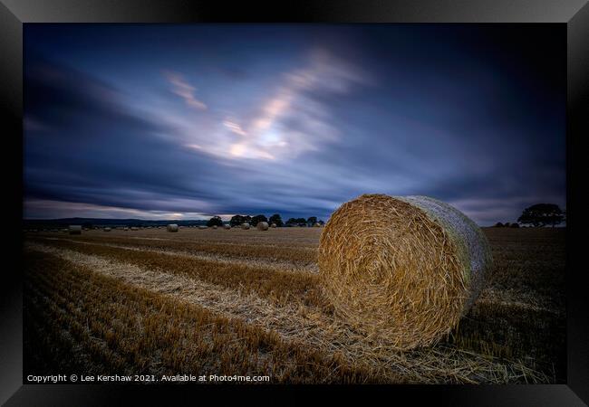 Hay rolls evening sky Framed Print by Lee Kershaw