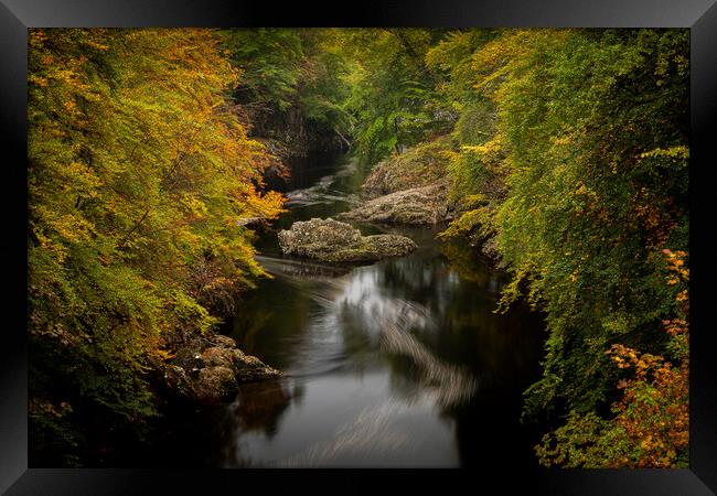 Still waters run deep on the River Garry, Scotland Framed Print by Clive Ashton