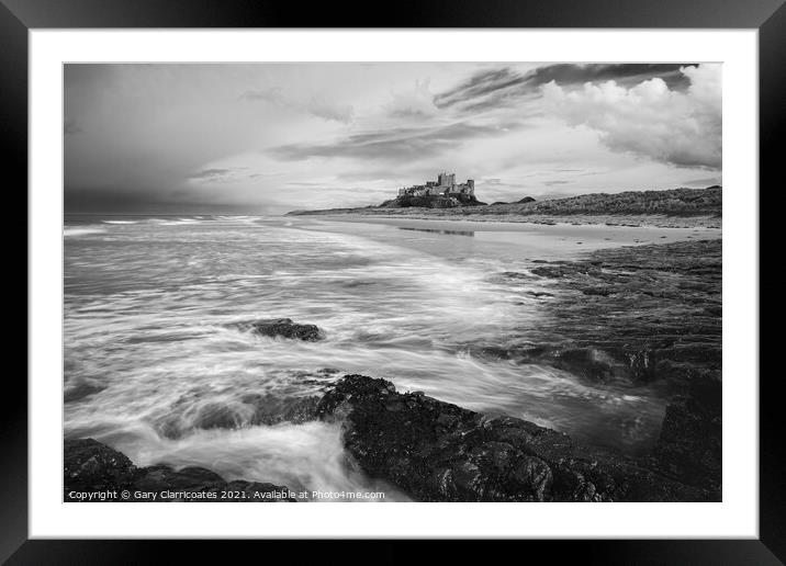 Moody Bamburgh Castle Framed Mounted Print by Gary Clarricoates