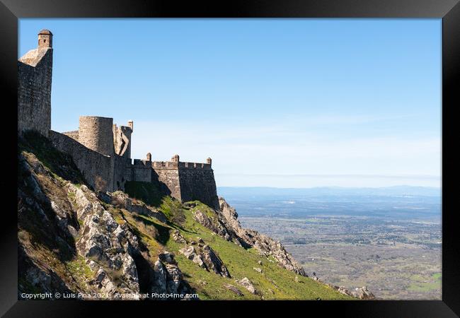 Marvao castle on the top of a mountain with beautiful green landscape behind on summer, in Portugal Framed Print by Luis Pina