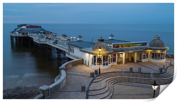 Day turns to night at Cromer pier Print by Jason Wells